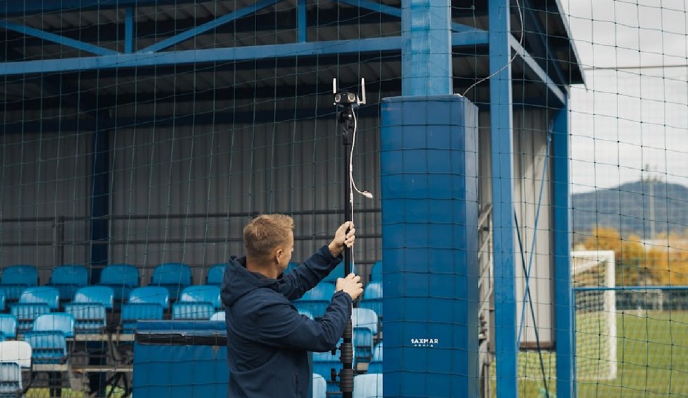 Reolink Duo 3 WiFi on a tripod at the pitch